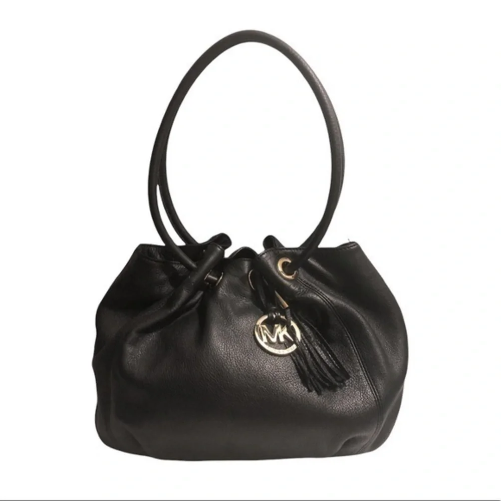 Michael kors black leather ringed tassel bag